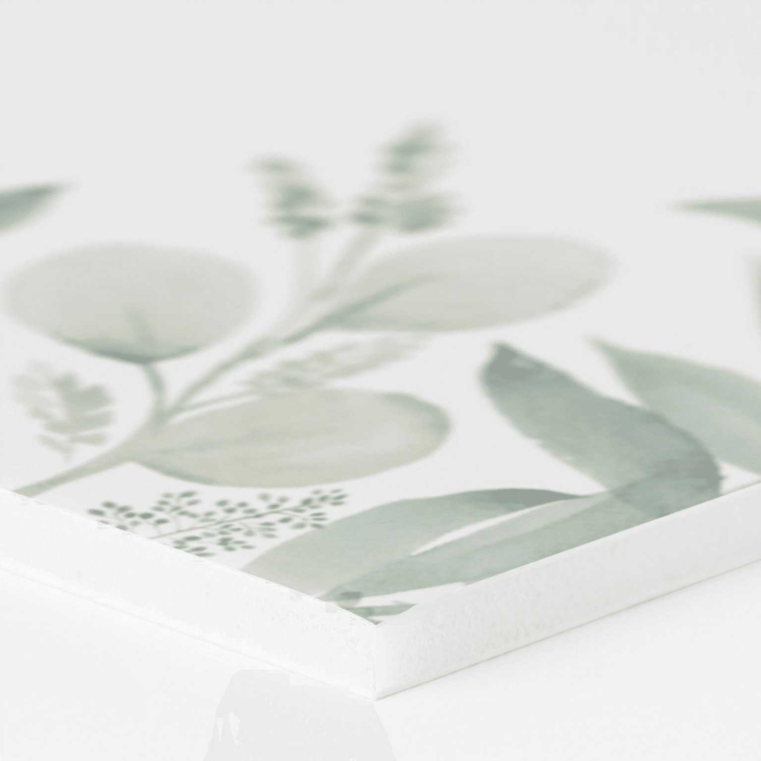 Close-up of a printed foam board panel showing its white edge