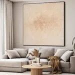 Wall-mounted SEG frame with a neutral art print above a sofa